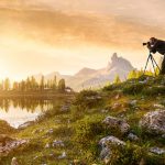 Man using a tripod to get sharp focus photos