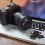 stock photo showing a camera and computer